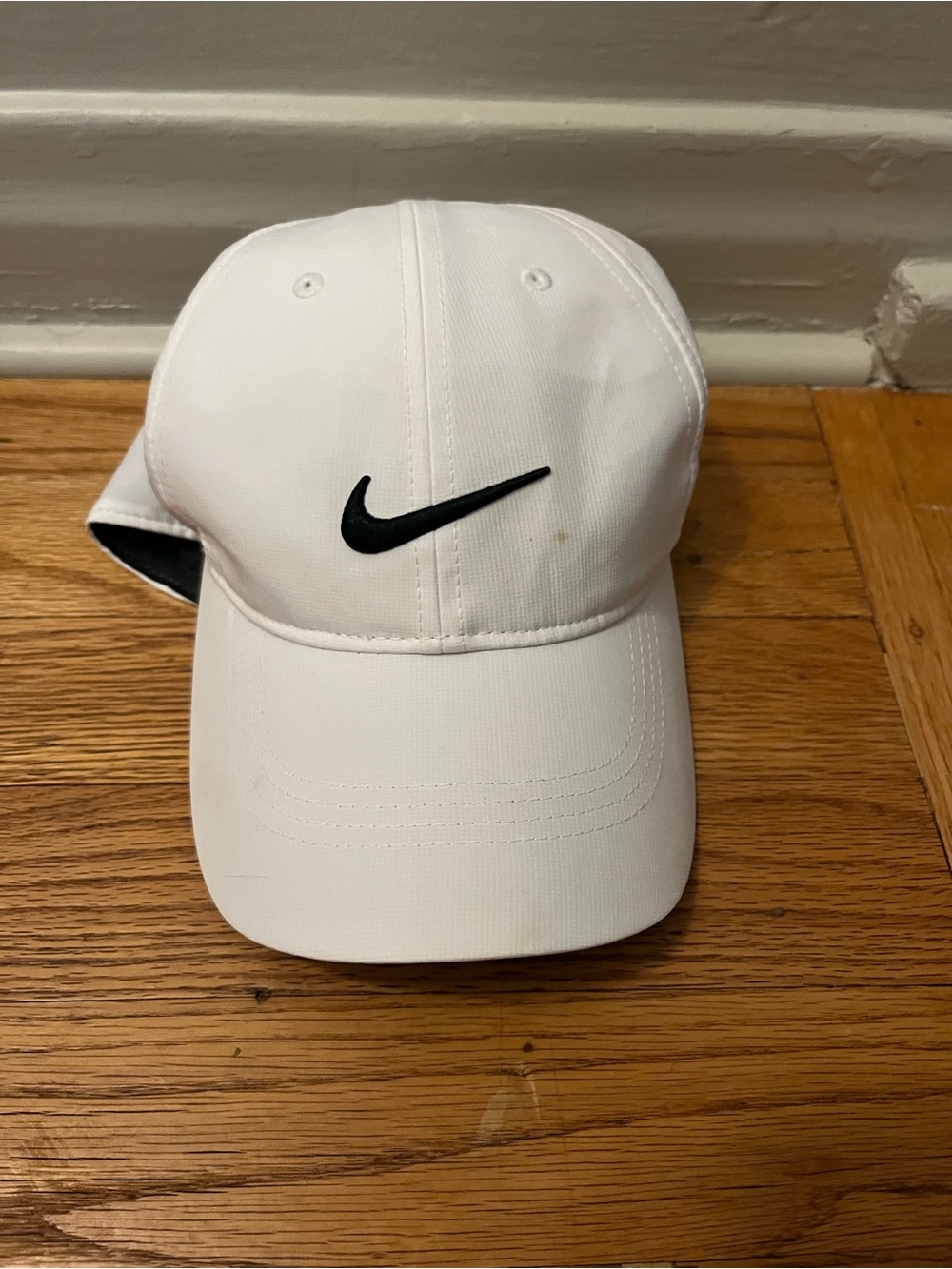 Nike White Baseball Hat with Black Swoosh Logo